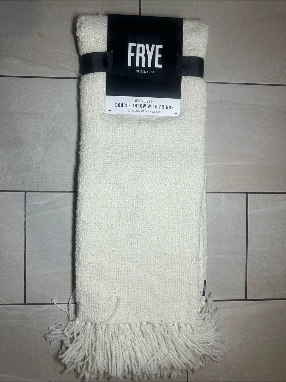 Frye Oversized boucle throw with Fringe 50x70 cream NWT 100% polyester